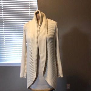 Cream colored large shapely weighty sweater